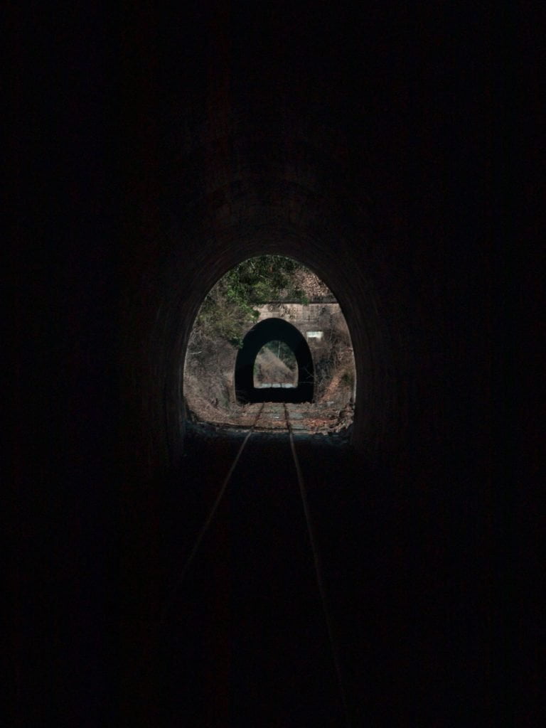 View through 2 rail trail tunnels